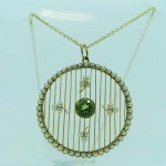 15ct Gold Peridot & 60 Pearls Pendant. Click for more information...