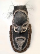 Papua New Guinea Mask with Shell Decoration. Click for more information...