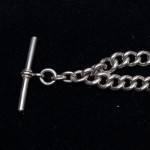 Sterling Silver Graduated Curb link Albert Chain. Click for more information...