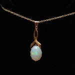 9ct Gold. Australian Solid Opal Pendant. Click for more information...